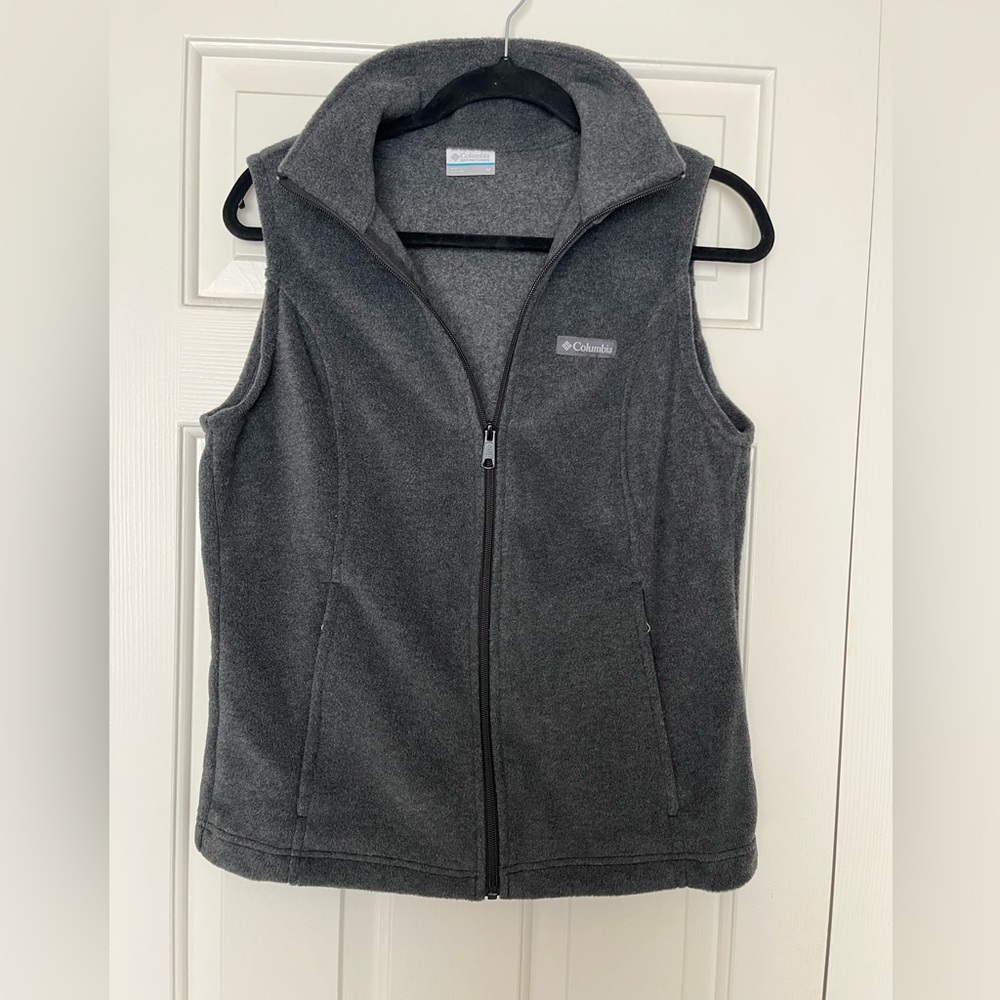 Women’s dark gray Columbia zip vest with pockets.
